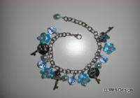 Blue flower and silver charm bracelet